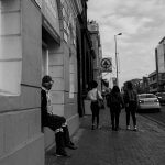 Man photographed in Cape Town Watchng people walk by